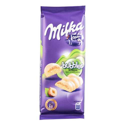 Шоколад белый пористый Milka bubbles с фундуком 83 г в Перекресток